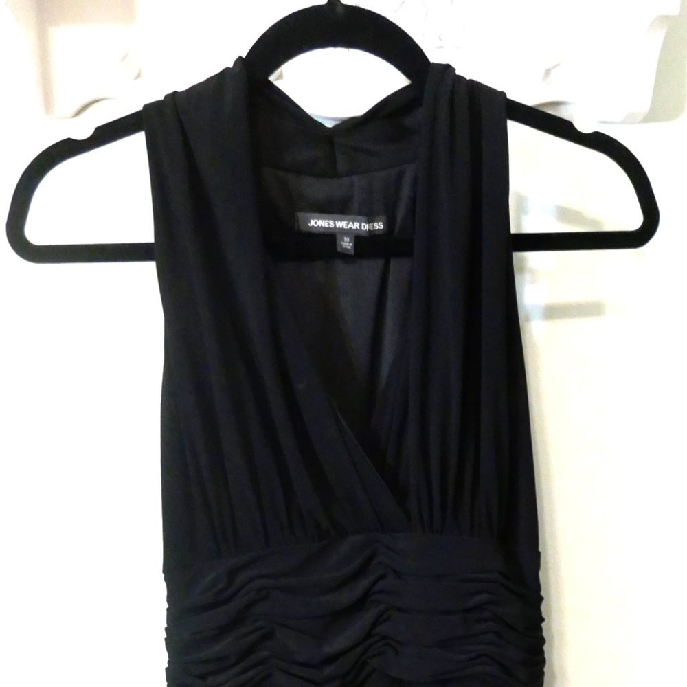 Black V-neck dress with interesting back.  Hangs nice & heavy. Size 10.